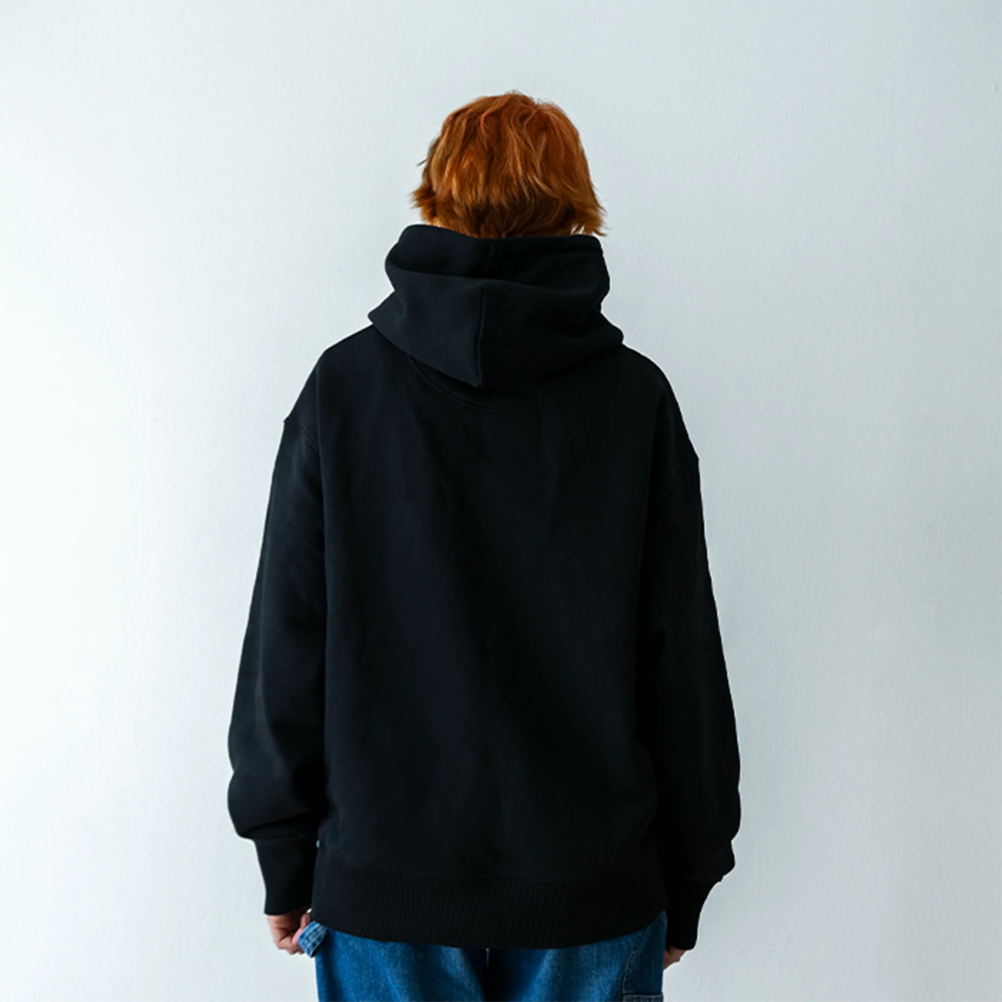 Schwarzer Unvind Oversize Hoodie Rueckseite